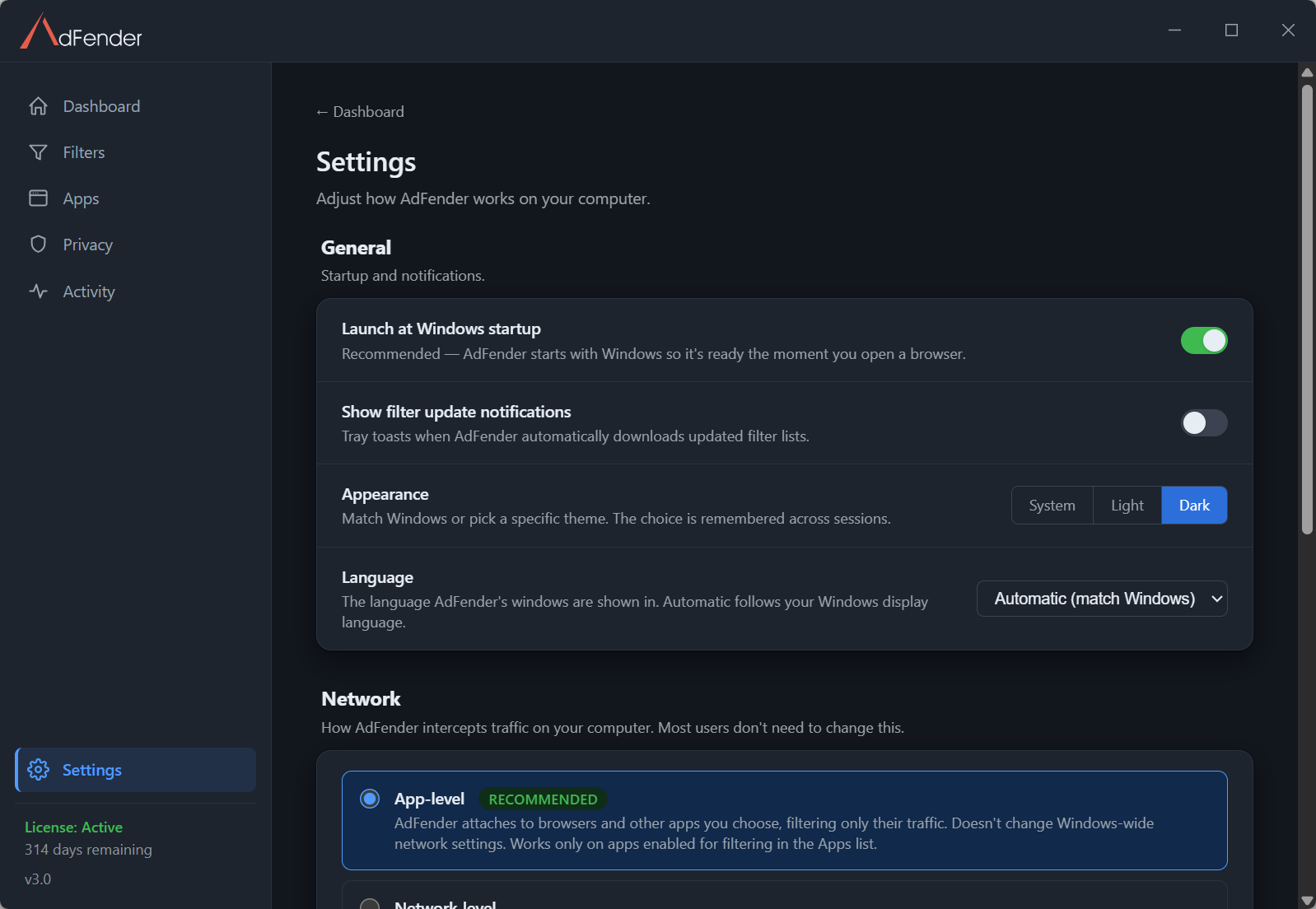AdFender Settings page showing launch-at-startup and filter-update notification toggles, a system/light/dark appearance choice, a language selector that can follow Windows, and app-level versus network-level filtering modes